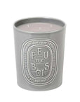 Feu de Bois 600g-duftlys i en grå, emaljert krukke.