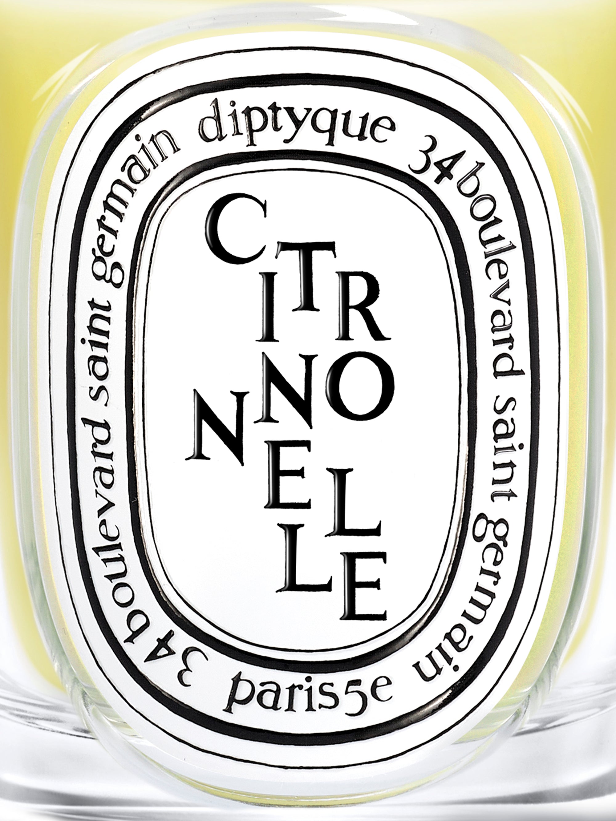 Close-up of Diptyque Citronnelle Candle displaying the elegant label and citrus scent branding.